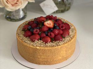 signature honey cake with fresh berries